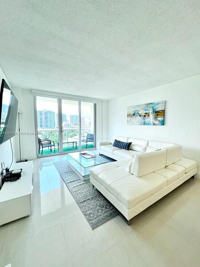 Building Photo - 19370 Collins Ave