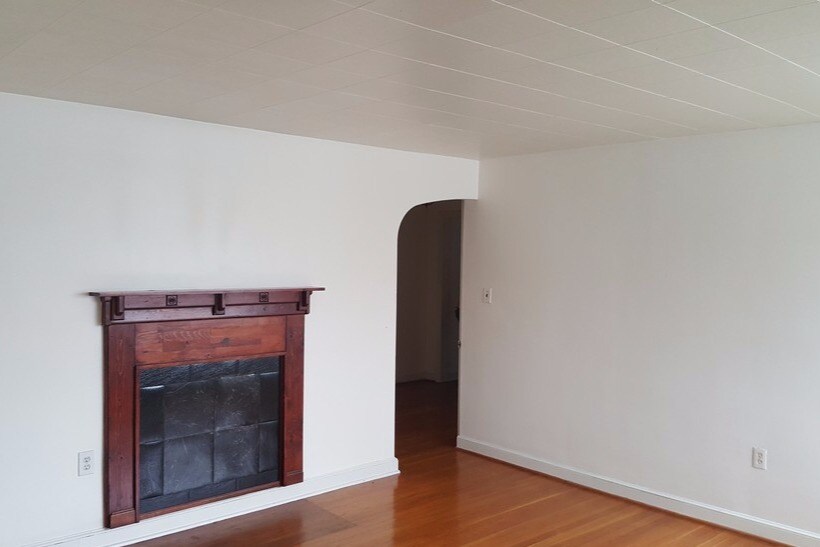 Living room view of decorative fireplace fron - 618 Biggs Ave