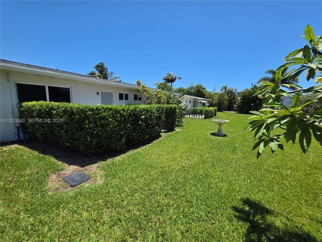 Building Photo - 120 NE 10th Ave