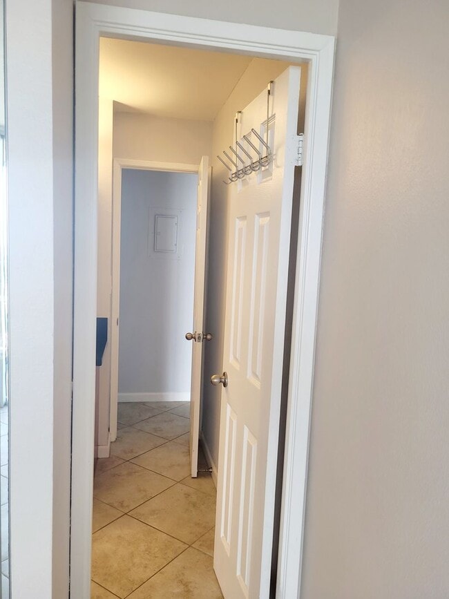 Building Photo - AVAILABLE | 2 Bedroom, 1 Bathroom Condo with 1 Assigned Parking Stall