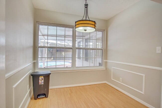 Building Photo - Pool Home with Office, Two Primary Suites ...