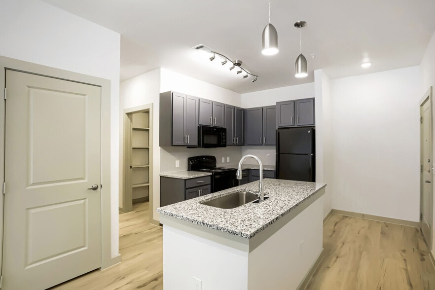 kitchen with view of front door and closet - Cleveland Pioneer Crossing