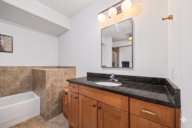 Building Photo - Urban Loft Condo Featuring Stunning Views & Rooftop Entertaining