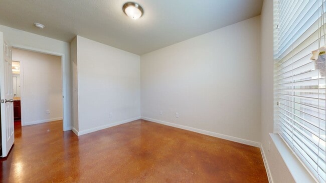 Building Photo - ALL STAINED CONCRETE FLOORING DUPLEX IN HA...