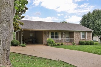 Building Photo - Dresden Home with Carport and Screened-in ...