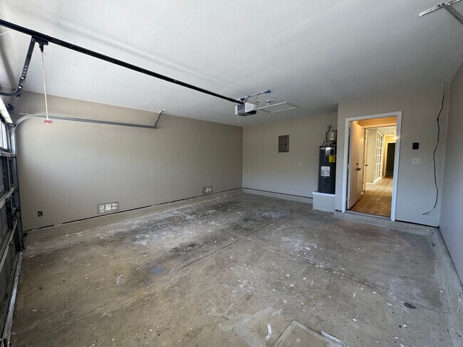 Building Photo - NEW PAINT, FLOORING, APPLIANCES & ROOF  | ...