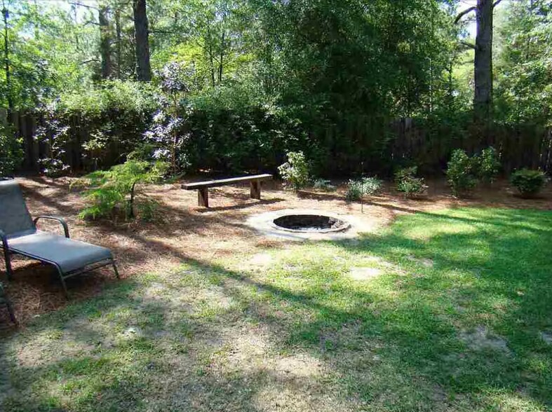 **Backyard now is fully landscaped with pinestraw** - 1104 Linden Rd
