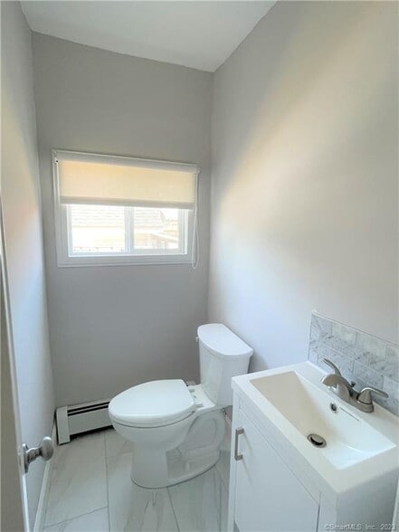 First floor full bath also with custom shade - 10 Treadwell St