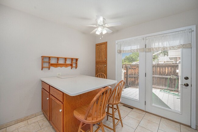 Building Photo - Welcome Home to Bristol Cove - Rare End-Unit Ranch Townhome in Centennial!