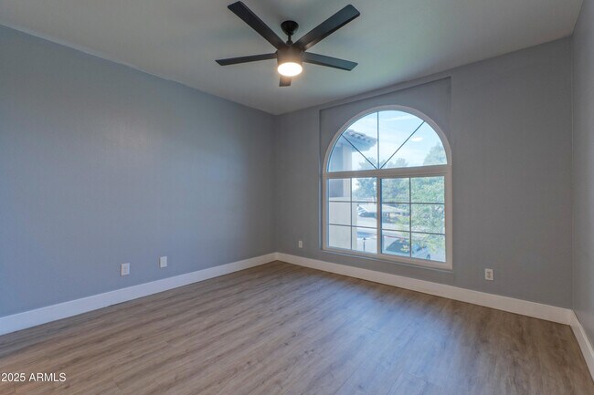 Building Photo - 9450 E Becker Ln