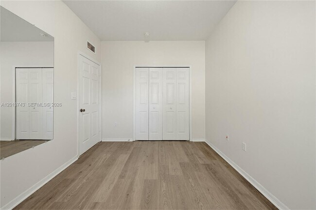 Building Photo - 3393 NE 11th Dr