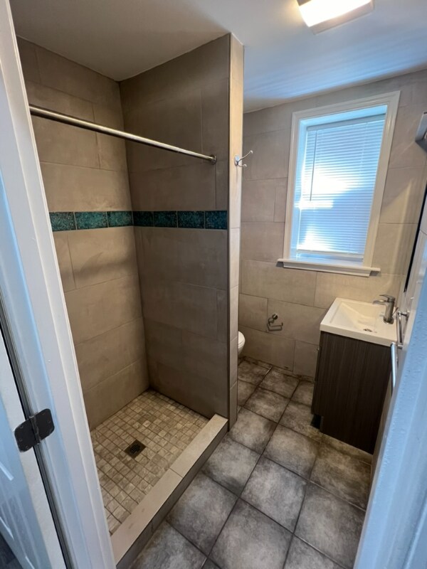 Building Photo - 7038 Woodland Ave