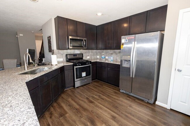 Building Photo - 8932 Hollister Commons Ln