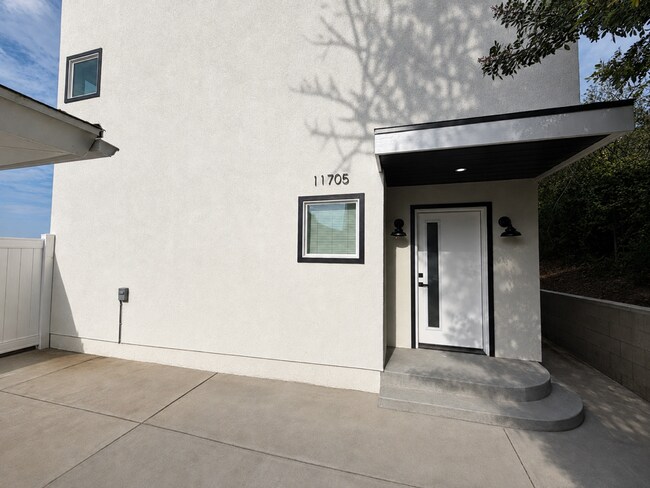 Building Photo - 11705 Woodley Ave