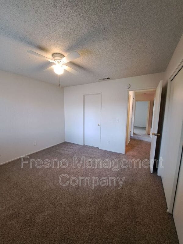 Building Photo - 4765 N Cedar Ave