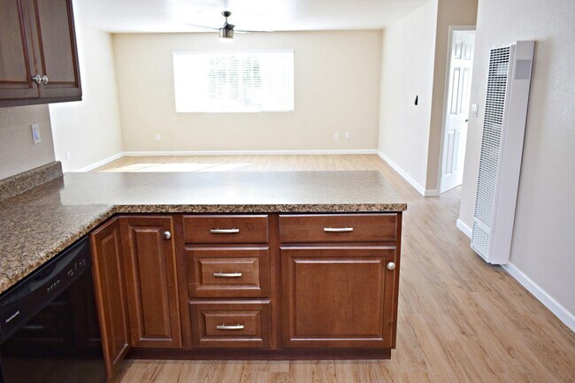 Building Photo - 2BR, 1BA Apartment Unit - Open Floor Plan, No Carpet , Double Pane Windows, and 1 Assigned Parkin...