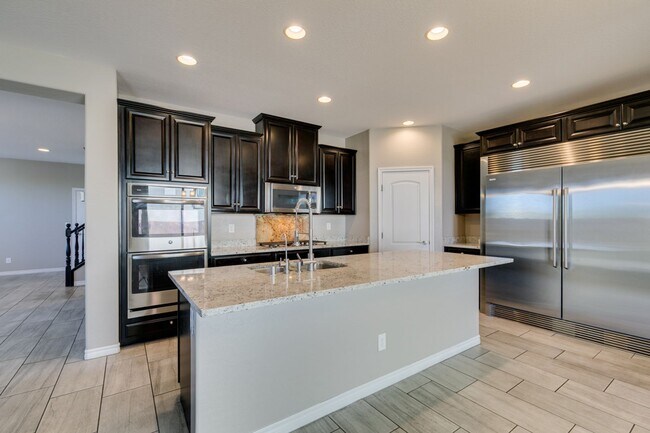 Building Photo - Beautiful Next-Gen Home with Private Entry Suite & Spacious Backyard