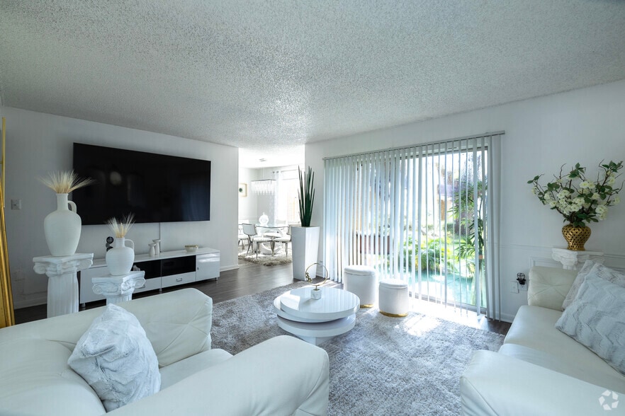 1BR, 1BA - Large - 839SF - Living Room - Parc Place Villas