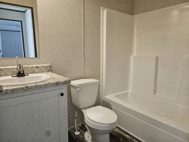 Building Photo - 6631 Hidden Oaks Dr
