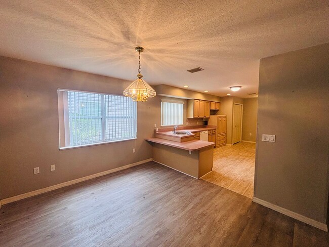 Building Photo - Waterfront Living in The Moorings at Point...