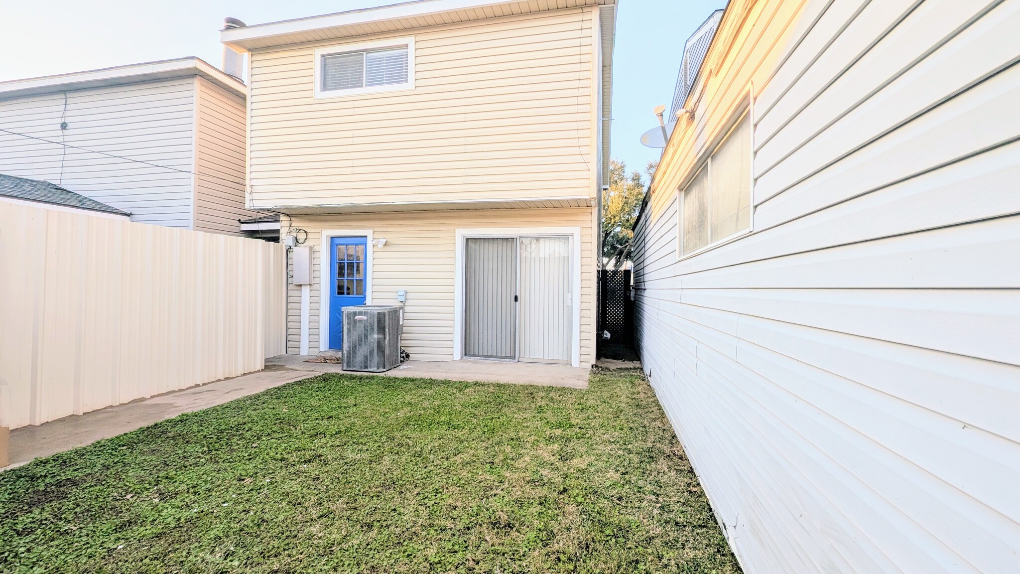 The backyard also has a patio of the dining room and gated access to the front. - 813 Clubside Dr