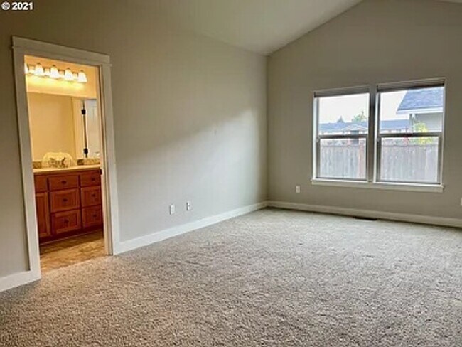Building Photo - Newer, single level home with double garage
