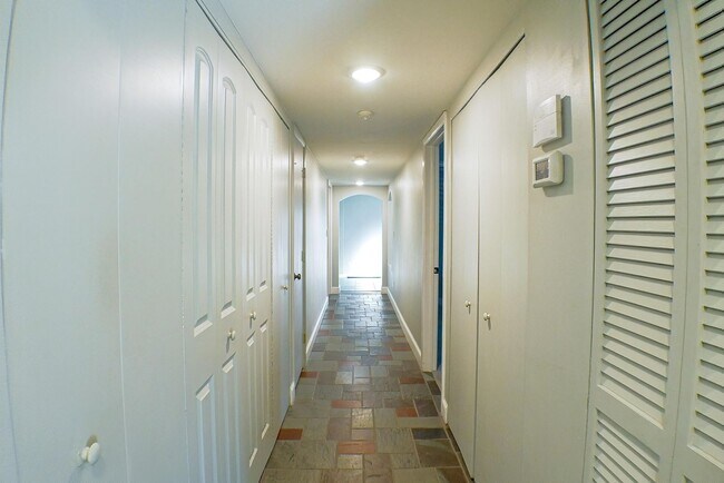 Building Photo - RARE ON MARKET , 2+den 2 1/2 bath overviewing a lake behind bell tower