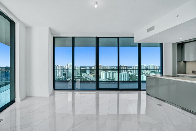 Building Photo - 18975 Collins Ave