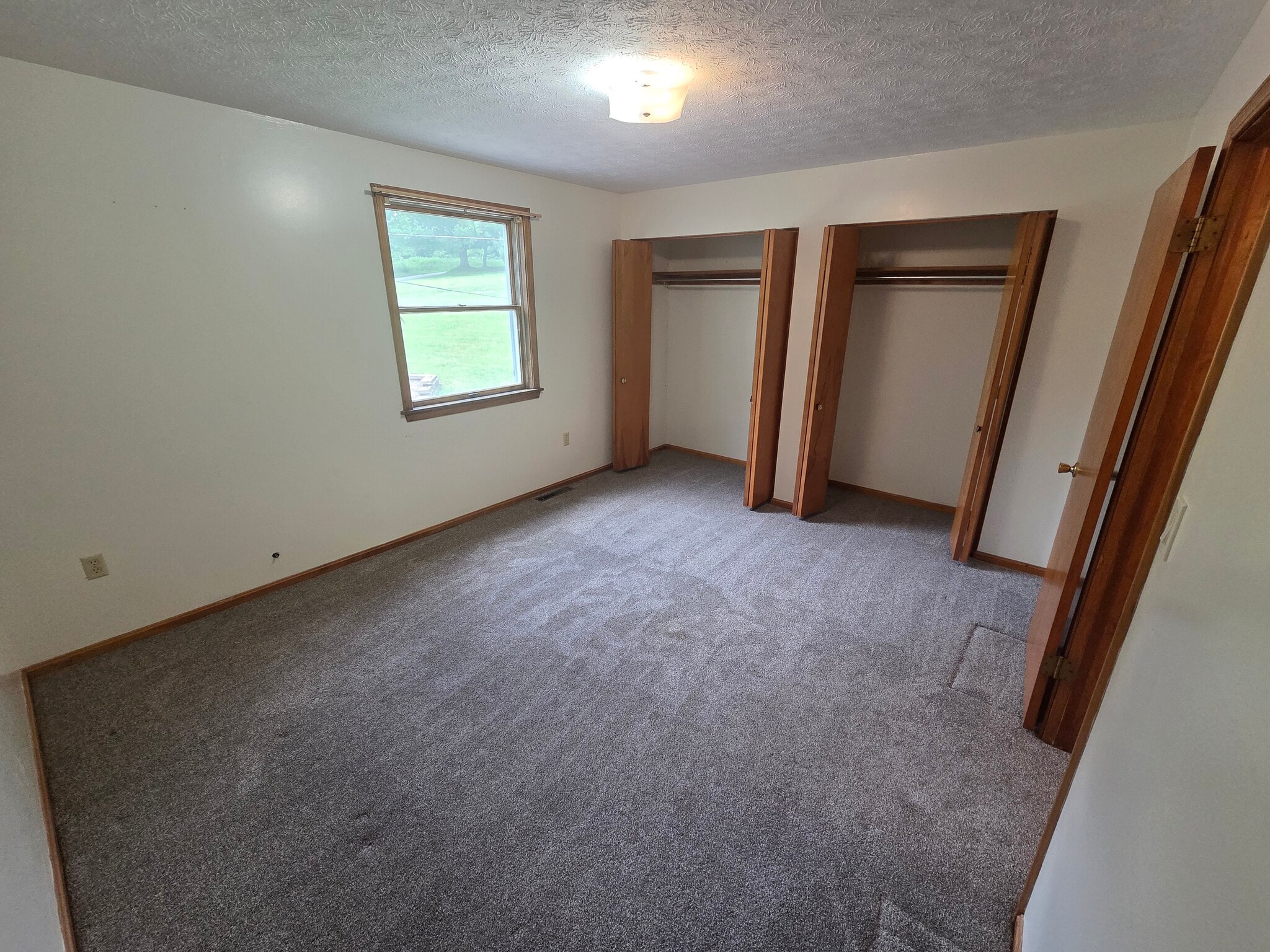 Front Bedroom w/ Two Large Closets - 5229 Rule Rd