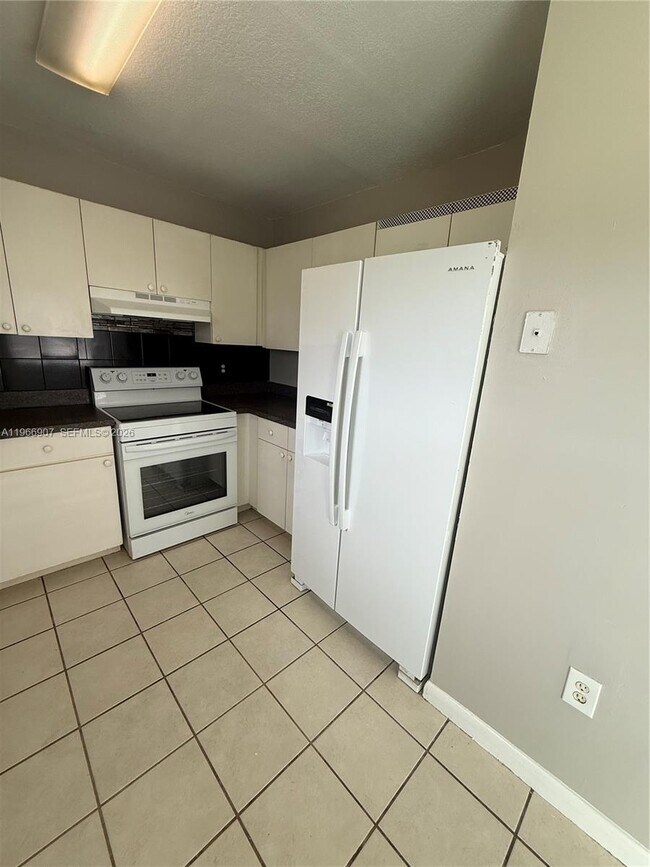 Building Photo - 1205 NW 7th Ave