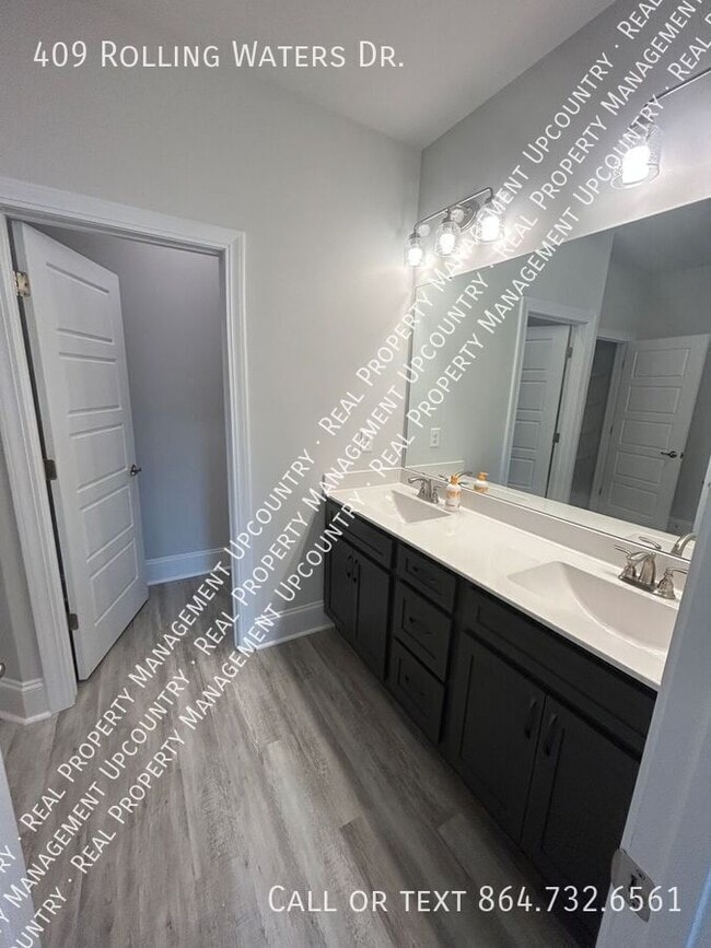 Building Photo - 409 Rolling Waters Dr