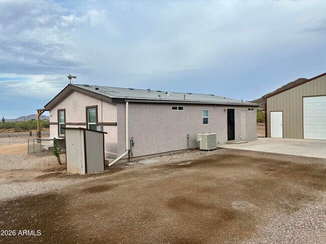 Building Photo - 42608 N 6th Ave