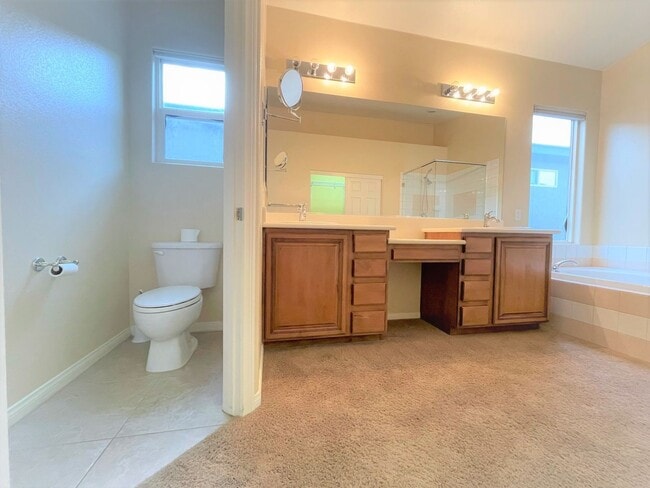 Building Photo - Vaulted Ceiling single-story home in a gat...