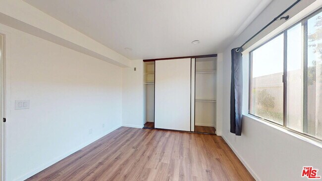 Building Photo - 10220 De Soto Ave