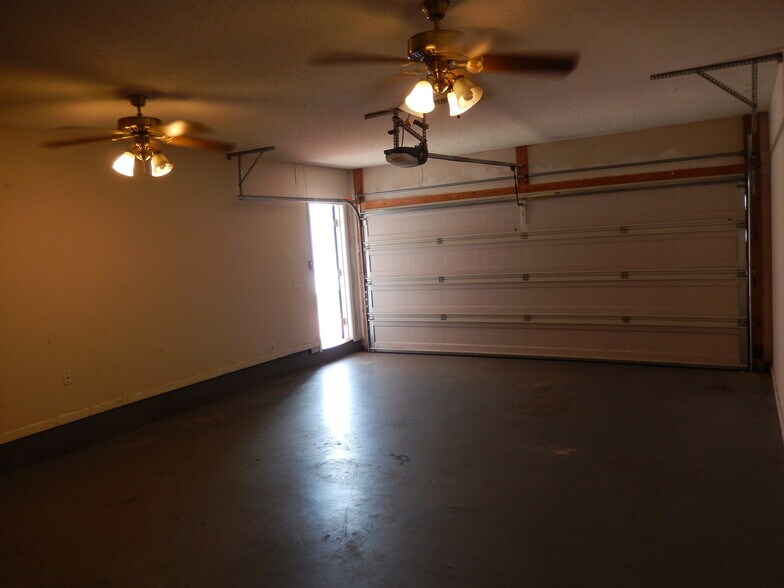 Inside of Garage with Ceiling Fans Installed - 2065 Pinemount Blvd