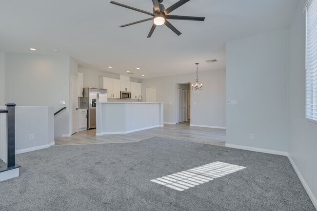 Building Photo - NW!! Gated!! Community Pool/Spa  Recreation Room!! New Paint!! New Flooring!!  Balcony!!  2 car g...