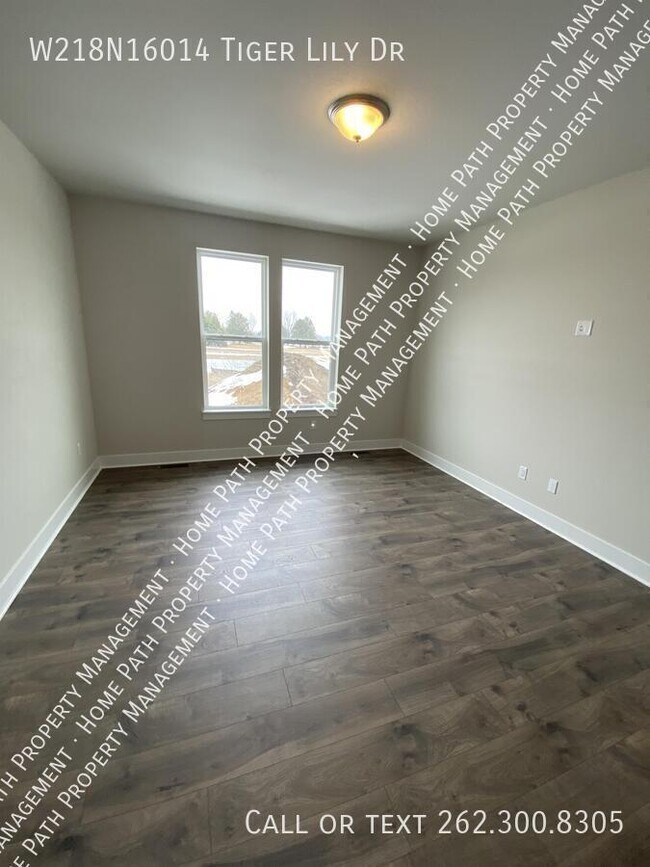 Building Photo - W218N16014 Tiger Lily Dr