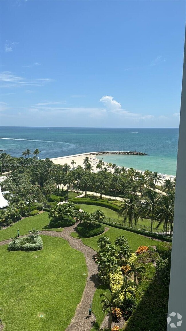 Building Photo - 10275 Collins Ave