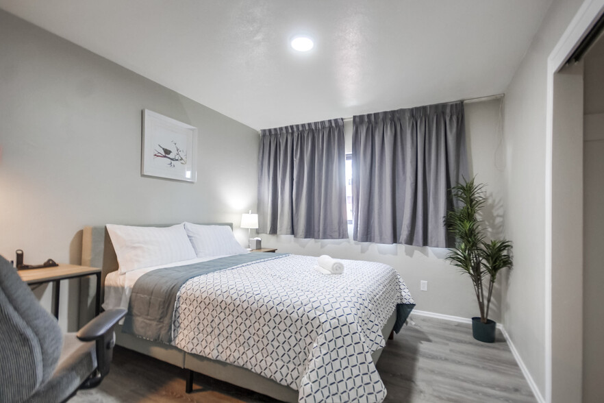 Catch up on work or study at the workspace with free WiFi in Bedroom 2 - 5551 Churchward St