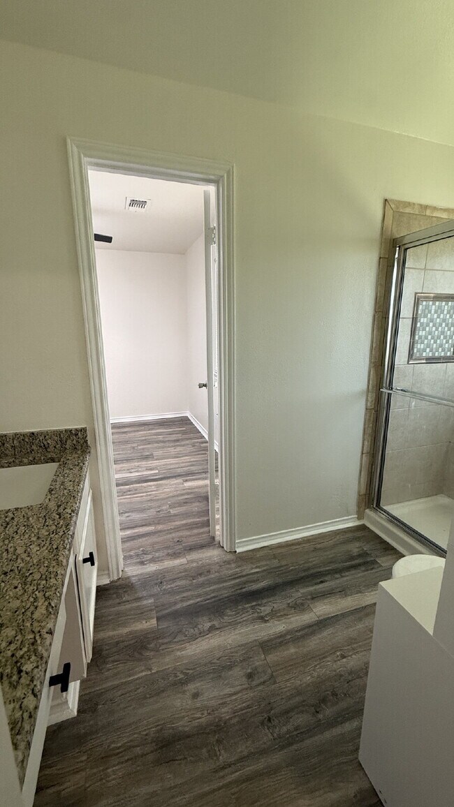 Building Photo - Updated 4-Bedroom 2 Bathroom Austin Home with Beautiful Backyard