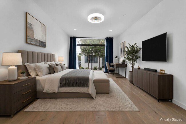 Building Photo - Modern 4-Bed with Rooftop Balcony & Dual Primary Suites