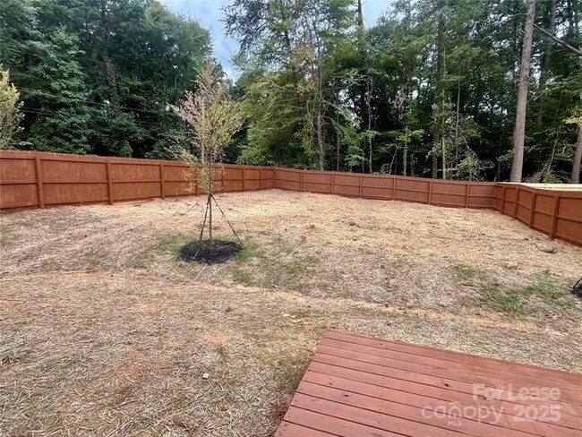 Building Photo - Brand new single family home with fenced y...
