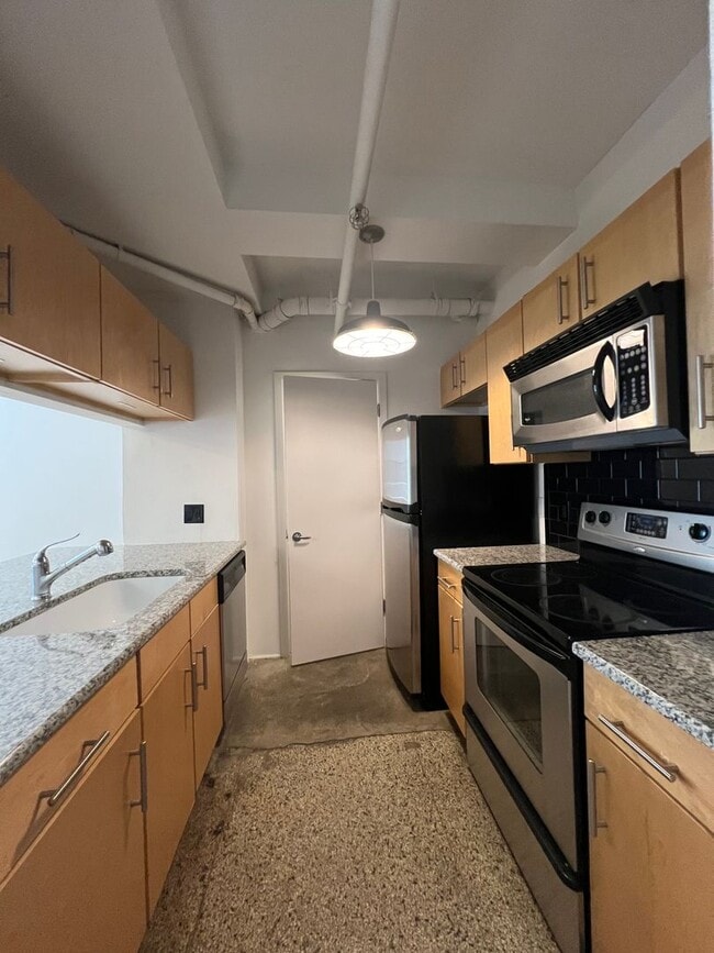 Building Photo - Amazing condo in historic Bennie Dillon Building