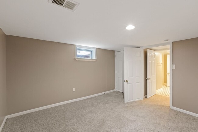 Building Photo - Move-In Ready Cape Cod with 3 Finished Levels & Huge Backyard