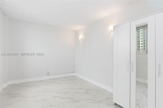 Building Photo - 19380 Collins Ave
