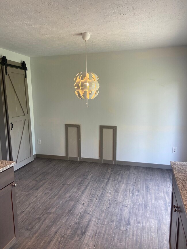 Dining area looks out over back yard and has room for a 6-person table - 174 Brisbane Ave