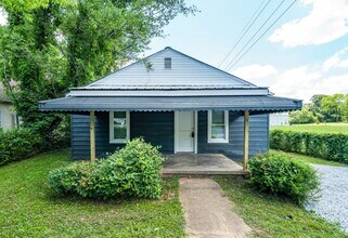 Building Photo - Don't miss this beautifully renovated 2-be...