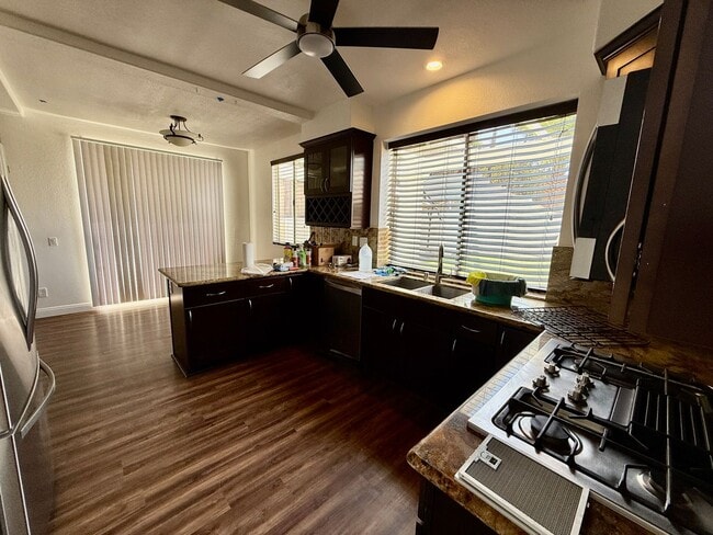 Building Photo - Spacious 4 Bedroom, 3 Bath Home with 3-Car Garage & Landscaping Included