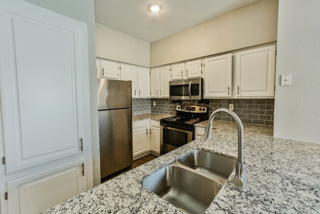 Building Photo - Your Next-Level Home Awaits – Specials Ava...