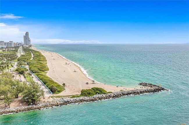 Building Photo - 10295 Collins Ave